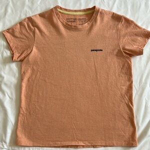 Patagonia women’s tee shirt size small light orange color.